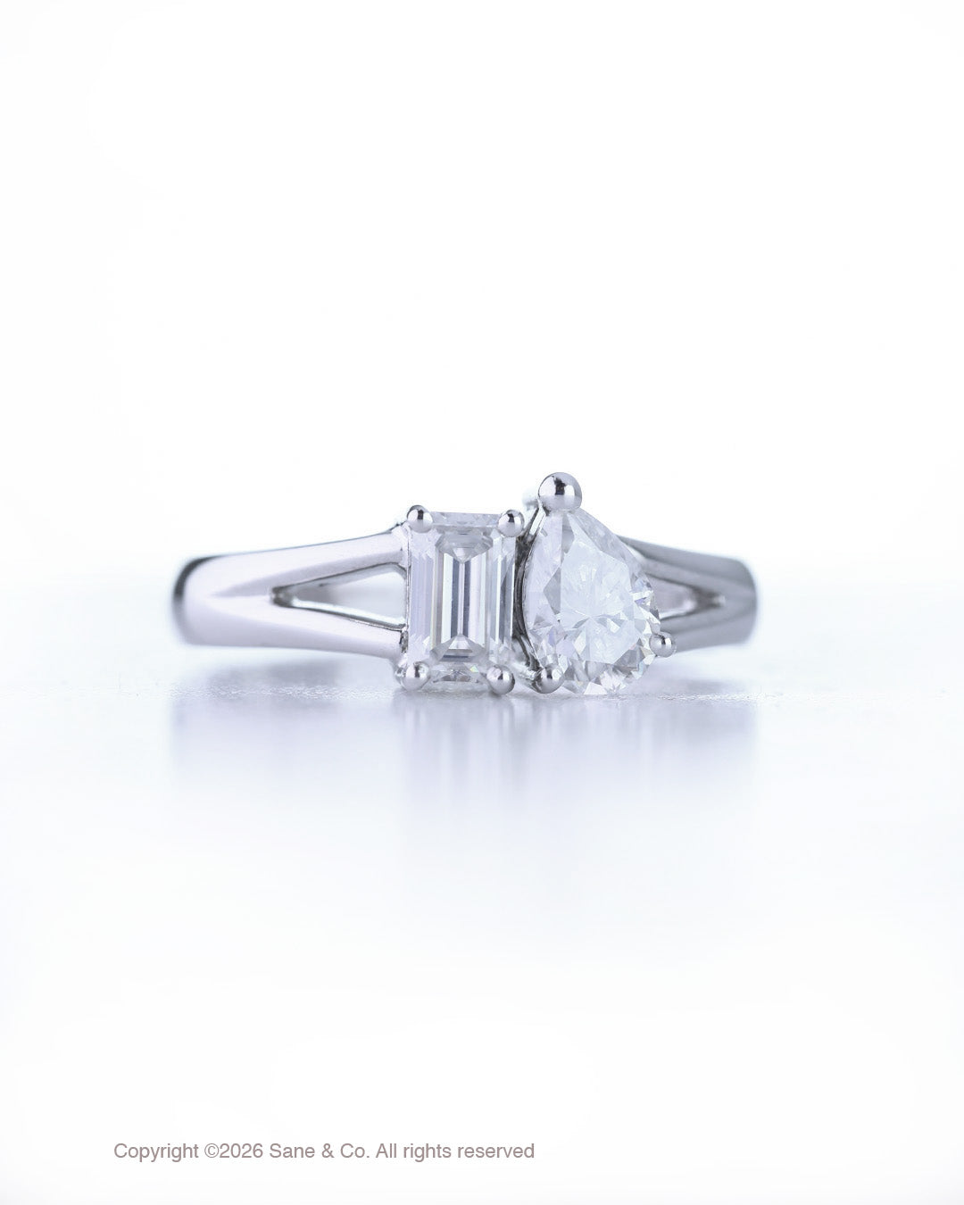 twin half carat ring in 14K white gold.